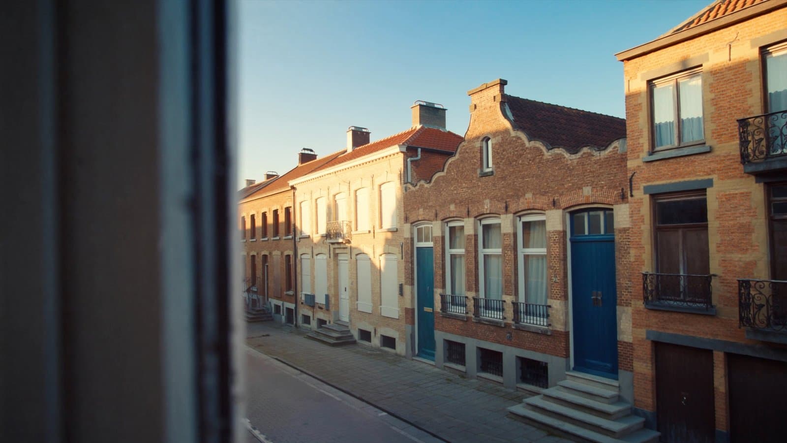 Vlaamse rijhuizen in het late licht